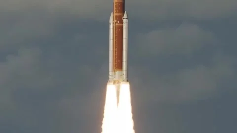 Space rocket launch ascending into the sky with massive fire trail during a Stock Footage 333784865