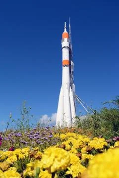 Space rocket in the Samara, View across flowerbed Stock Photos