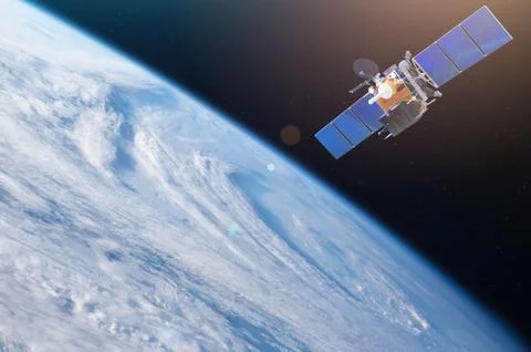 Space satellite orbiting the earth. Elements of this image furnished by NASA 库存照片