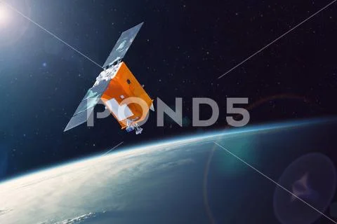 Space satellite orbiting Earth low polar orbit. Bright light from the sun and Stock Photos