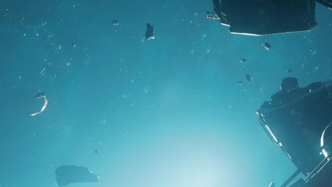 Space scene with asteroids floating in the dark expanse and light from the sun Stock Footage 345043166