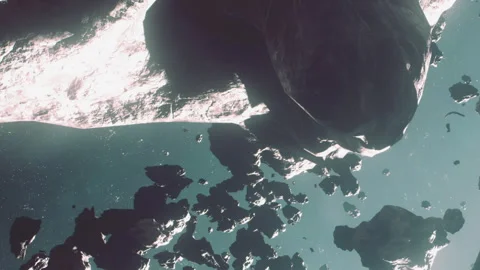 Space scene with many asteroids floating in deep space near a bright star Stock Footage 344886953