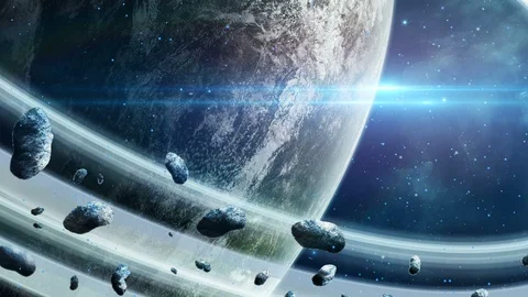 Space scene. Planet with ring and asteroids with blue light. Elements furnish Stock Footage 96169485