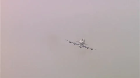 Space Shuttle Atlantis atop NASA Boeing 737 climbing after take off Stock Footage 283627182