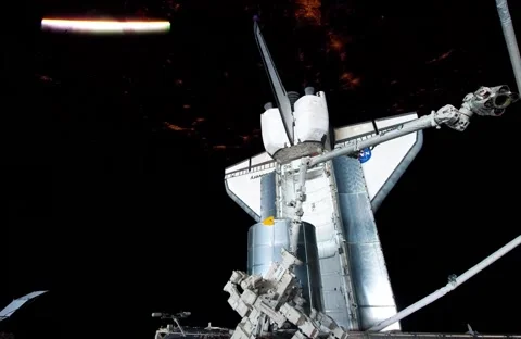 Space Shuttle Discovery over Earth from the International Space Station Stock Footage 261160136