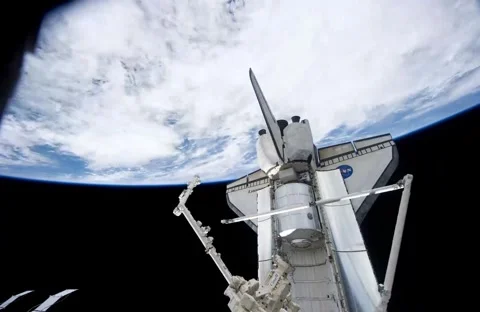 Space Shuttle Discovery over Earth from the International Space Station Stock Footage 261160191