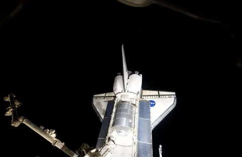 Space Shuttle Discovery over Earth from the International Space Station Stock Footage 261160193