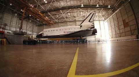 Space Shuttle Endeavour in hanger at LAX 2012 dolly sliding shot Video stock 18960650