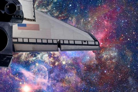 Space Shuttle flight over space nebula. Stock Photos