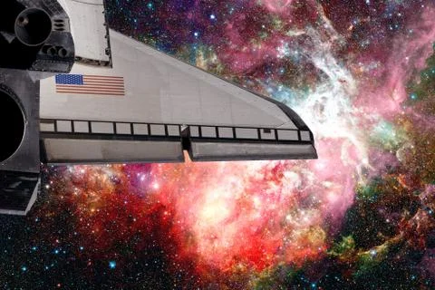 Space Shuttle flight over space nebula. Stock Photos