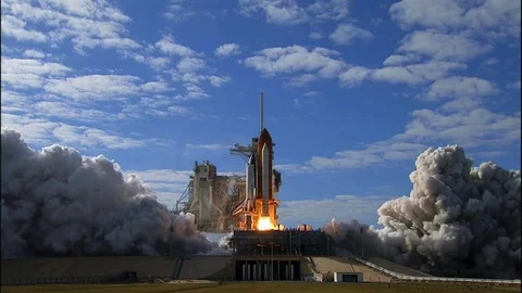 The Space Shuttle Lifts off from its launchpad. Stock Footage 74798542