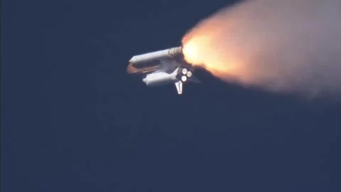 Space Shuttle moving into the sky with smoke trails. Stock Footage 329028638