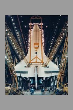 The Space Shuttle Orbiter Enterprise is lowered to the floor of the transf... Stock Photos