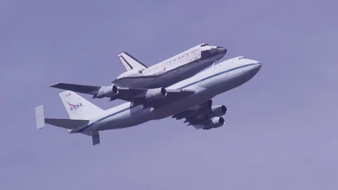 Space Shuttle rides 747 Stock Footage 77859268