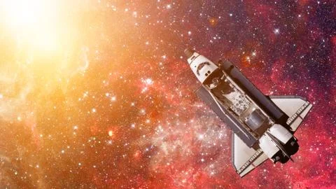 Space shuttle spaceship in universe. Elements of this image furnished by NASA Stock Photos