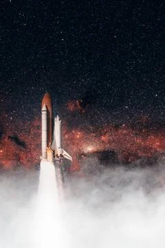 Space Shuttle takes off into space. Elements of this image furnished by NASA. Stock Photos