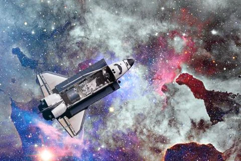Space Shuttle taking off on a mission. Elements of this image furnished by NA Stock Photos