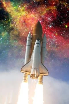 Space shuttle taking off on a mission. Elements of this image furnished by NA Foto stock