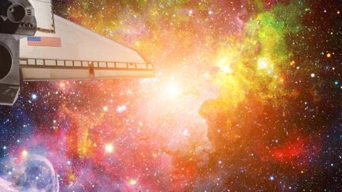 Space shuttle taking off on a mission. Elements of this image furnished by NA Stock Photos
