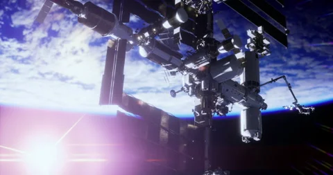 Space station in low Earth orbit surrounded by sunlight and atmosphere Stock Footage 317780559