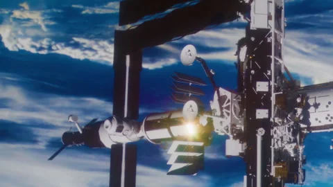 Space station orbiting Earth while performing tasks in low gravity Stock Footage 344129723