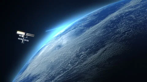 A space station in space orbiting the globe emits laser blue beams toward ear Stock Footage 196090245