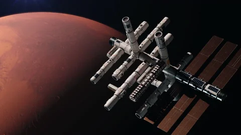 A space station in space orbiting mars. the concept of space travel and explo Stock Footage 220320428