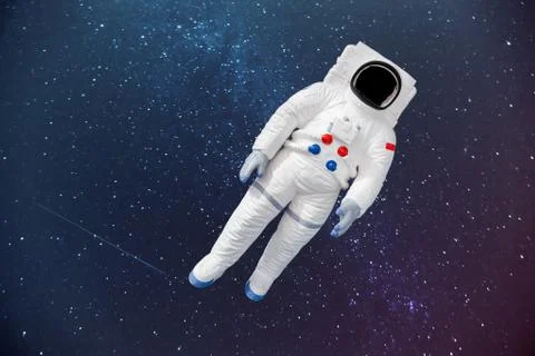 Space suit in the space background with empty place for face. Stock Photos