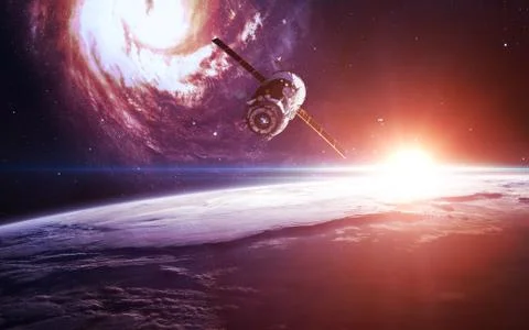 Spacecraft at earth orbit Stock Photos