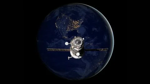 Spacecraft Progress orbiting the earth. Stockfoto's