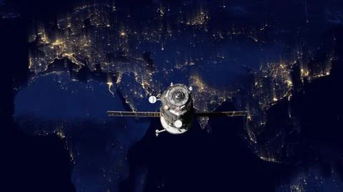 Spacecraft Progress orbiting the earth. Stockfoto's