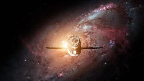Spacecraft Progress orbiting the earth. Stock Photos