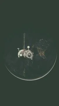 Spacecraft Progress orbiting the earth. Stockfoto's