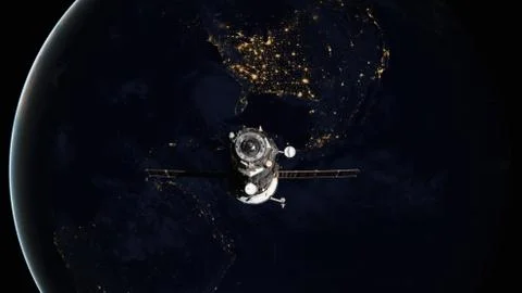 Spacecraft Progress orbiting the earth. Stockfoto's
