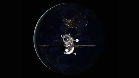 Spacecraft Progress orbiting the earth. 库存照片