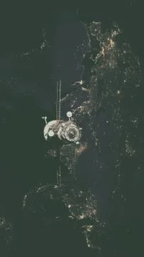 Spacecraft Progress orbiting the earth. Stockfoto's