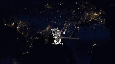 Spacecraft Progress orbiting the earth. Spacecraft Progress orbiting the e... Stockfoto's