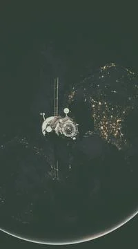 Spacecraft Progress orbiting the earth. Spacecraft Progress orbiting the e... Stockfoto's