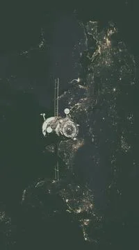 Spacecraft Progress orbiting the earth. Spacecraft Progress orbiting the e... Stockfoto's