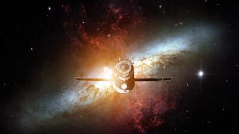 Spacecraft Progress orbiting the nebula. Stockfoto's