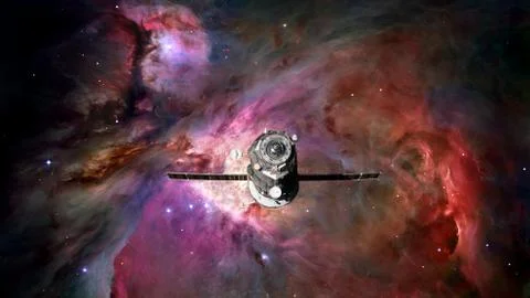 Spacecraft Progress orbiting the nebula. Stockfoto's