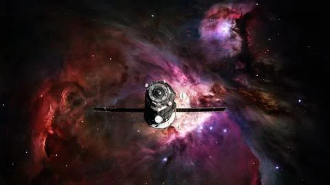 Spacecraft Progress orbiting the nebula. Stock Photos