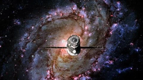 Spacecraft Progress orbiting the spiral galaxy. 写真素材