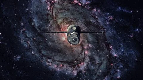 Spacecraft Progress orbiting the spiral galaxy. 库存照片
