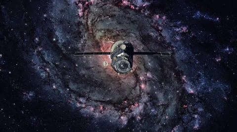Spacecraft Progress orbiting the spiral galaxy. Spacecraft Progress orbiti... 库存照片