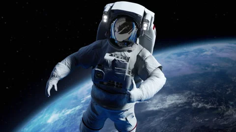 Spaceman Astronaut floating in outer space. science or space travel Thumbs up 動画素材 299269771