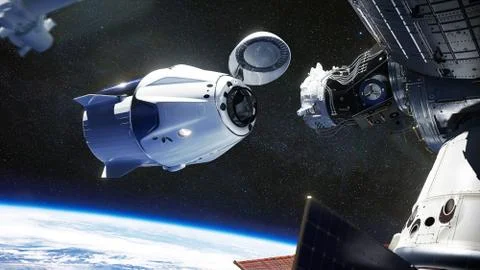 SpaceX Crew Dragon spacecraft docking to the International Space Station. Dra Stock Photos