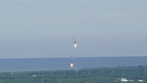 SpaceX Falcon 9 rocket GOES-U satellite launch side boosters landing Stock Footage 278456840