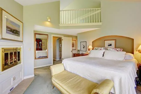 Spacious beautiful bedroom with deck Stock Photos