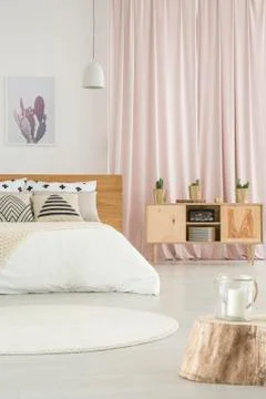 Spacious bedroom with rustic cupboard Stock-Fotos